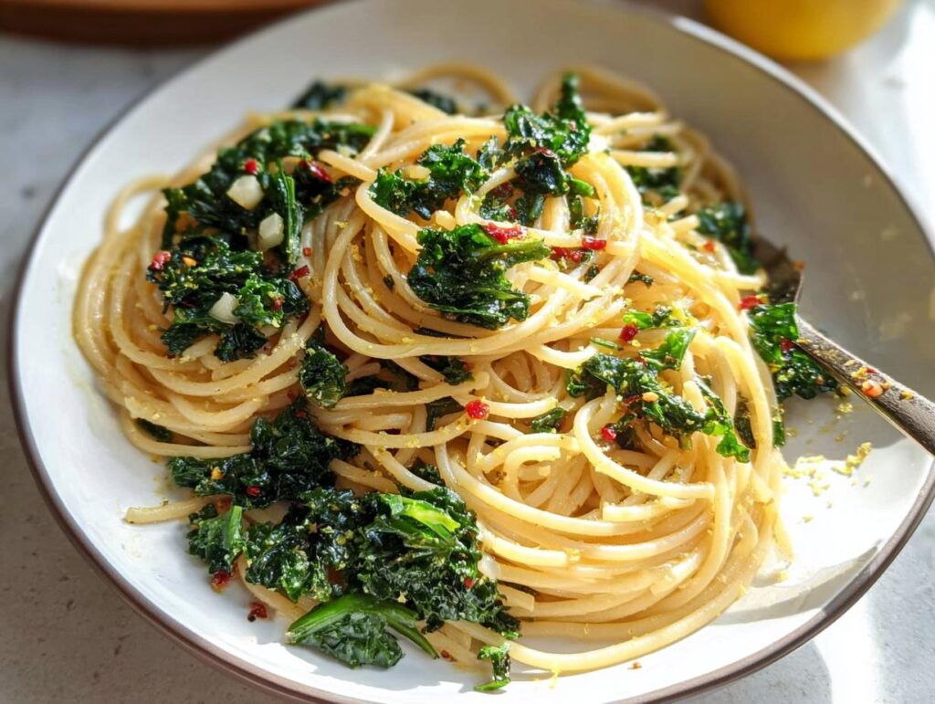 A vibrant plate of spaghetti tossed with kale, chili flakes, and garlic, showcasing bold flavor in easy dinner recipes.